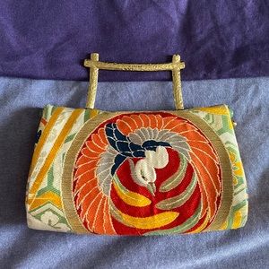 Natori embroidered clutch bag